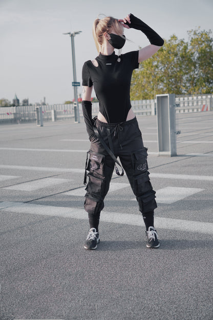 White women wearing a techwear styled Body Suit Top Set in color Black